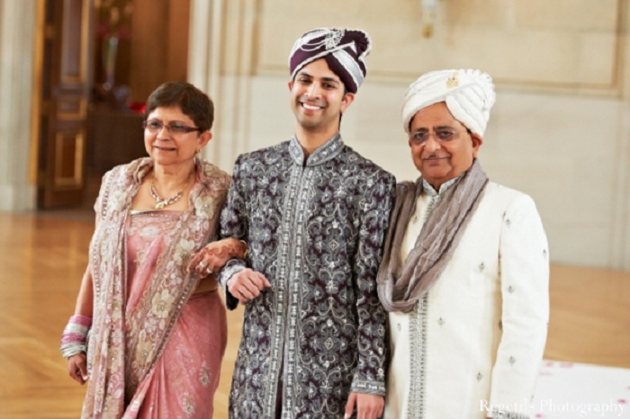 Photo of Bride with father in maroon velvet lehenga and unique blouse