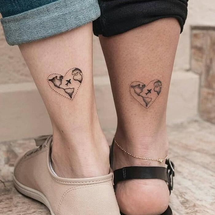 Matching heart tattoos on leg