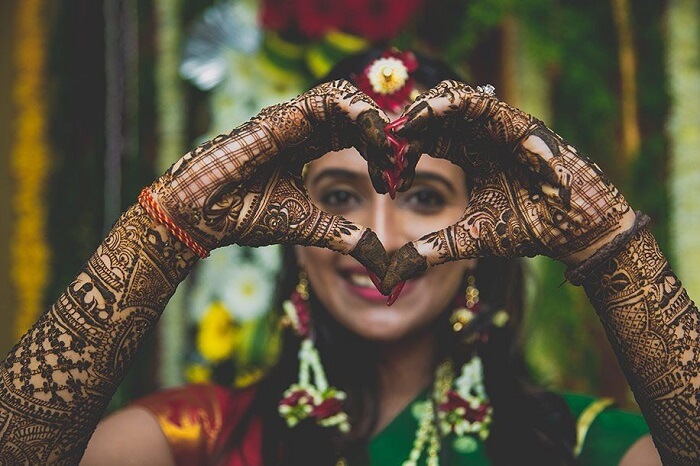Happy Indian bride at mehndi function. | Mehendi photography, Bride photos  poses, Indian bride photography poses