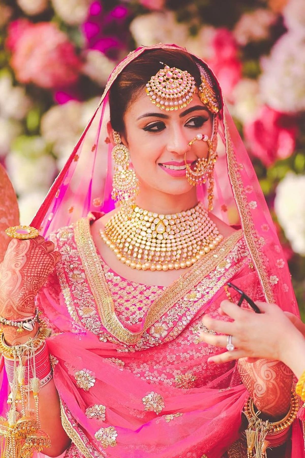 Sikh Bride Wore A Green And PinkHued Salwar Suit With Parandi Hairstyle  For Her Wedding Day