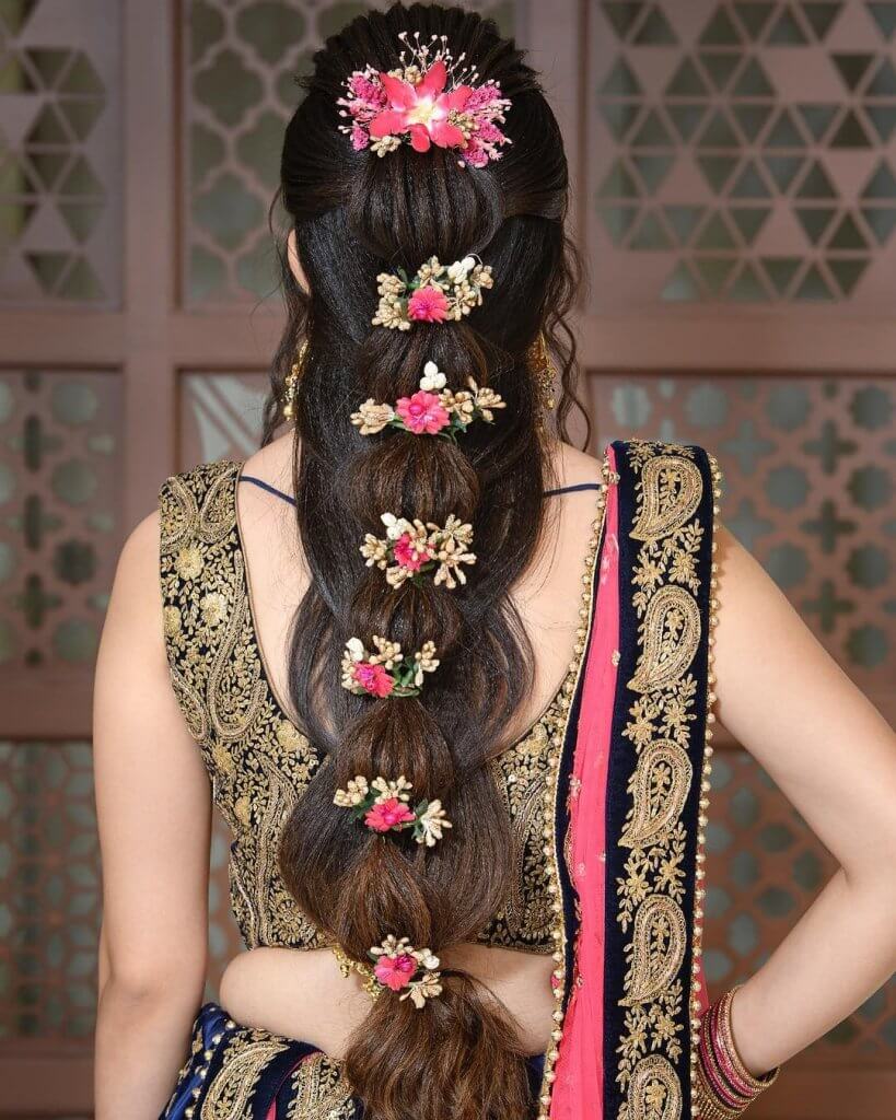 5 Hairstyle Ideas Perfect For Your Sangeet Night | Stylish ponytail, Hair  style on saree, Bridal hair buns